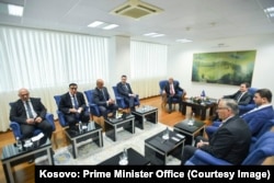 Fotografi e vitit 2022 nga një takim i Kurtit me krerë dhe zyrtarë të lartë të partive opozitare shqiptare. Aty shihen edhe tre zyrtarët partiakë të PDK-së, LDK-së, dhe AAK-së që garuan për pozitën e kryeministrit në këto zgjedhje: Bedri Hamza, Lumir Abdixhiku, Ramush Haradinaj.