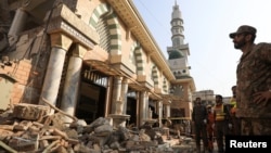 د جنورۍ پر ۳۰مه د پېښور پولیس لاینز پر جومات برید کې لسګونه کسان ووژل شول - د جنورۍ ۳۱مې انځور.