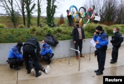 Protest împotriva Jocurilor Olimpice de la Beijing (2022), în fața Comitetului Olimpic Internațional din Lausanne, Elveția.