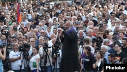 Armenia - Archbishop Bagrat Galstanian addresses supporters rallying outside the parliament, Yerevan, June 17, 2024.