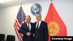 Болотбек Борбиев менен Дональд Лу.