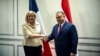 Premierul maghiar Viktor Orbán și Marine Le Pen, 29 ianuarie 2022, la Madrid.