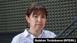 Нуриза Өмүрбаева.