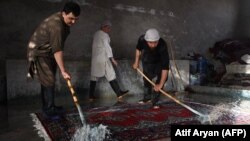 یکی از قالین شویی ها در کابل 