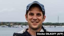  ایوان گرشکویچ، خبرنگار روزنامۀ وال استریت ژورنال که در روسیه بازداشت شده است. 