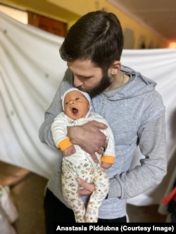 Чоловік Насті із сином