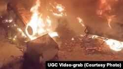 پولیس وايي پارېدلو کسانو په تاڼې برید وکړ او ورته یې اور واچاوه - د جون ۲۰مې انځور. 