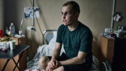 With No Legs And No Sight, A Ukrainian Soldier Strives To Walk And See Again