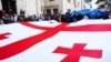 Під час протестів в Грузії, окрім державних прапорів, багато також прапорів і ЄС 