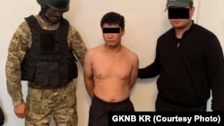 Бекназар Боругул уулу во время задержания в 2023 году.