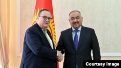 Лесли Вигери и Нурланбек Шакиев.