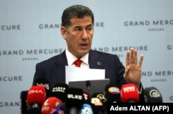 Синан Оган.