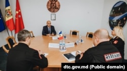 Konstantin Ziablikov (centru, plan îndepărtat) la o întrevedere cu conducerea Direcției Generale a Carabinierilor, la Chișinău, după acreditarea sa în R. Moldova, în august 2021