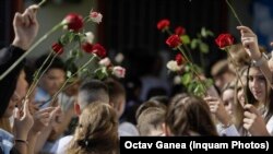 Imagine de la festivitatea de deschidere a cursurilor la o şcoală gimnazială din Bucureşti.