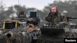 German Defense Minister Boris Pistorius visits Leopard II tanks due to be supplied to Ukraine at the Lipperland tank brigade of Germany's army in Augustdorf, Germany, on February 1.