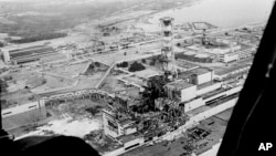 O vedere aeriană din luna mai 1986 a centralei nucleare de la Cernobîl, locul celui mai grav accident nuclear din lume, este văzută la câteva zile după explozia din 26 aprilie în același an.