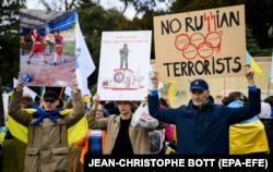 Акція з вимогою не допустити спортсменів Росії та Білорусі до участі в Олімпіаді 2024 року в Парижі через війну проти України. Лозанна, Швейцарія, 25 березня 2023 року