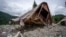 A cottage lies in ruin after a devastating landslide struck the resort town of Shovi on August 3, 2023.