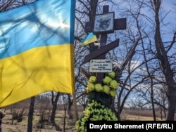 Меморіальний хрест у Бузковому парку