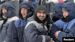 Орусиядагы мигранттар. Иллюстрациялык сүрөт.