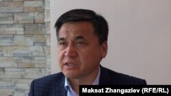 Каныбек Иманалиев.