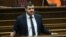 Armenia - Arman Yeghoyan, head of parliament committee on European integration, speaks at a parliamentary hearing, Yerevan, June 21, 2024.
