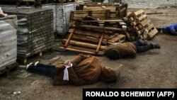 Закатовані російськими військовими цивільні зі зв'язаними руками. Буча, 3 квітня 2022 року