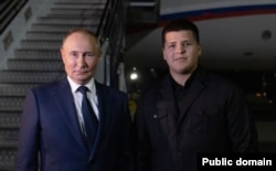 Владимир Путин и Адам Кадыров в Грозном