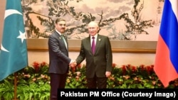 د انواارلحق کاکړ او ويلاديمير پوتين په بیجينګ کې د ملاقات په وخت