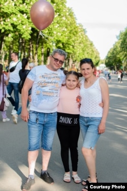 Настя Гріценко з батьками