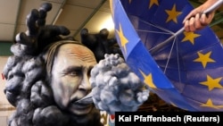 A sculpture depicts Russian President Vladimir Putin at the annual carnival in Mainz, Germany, in February 2023.