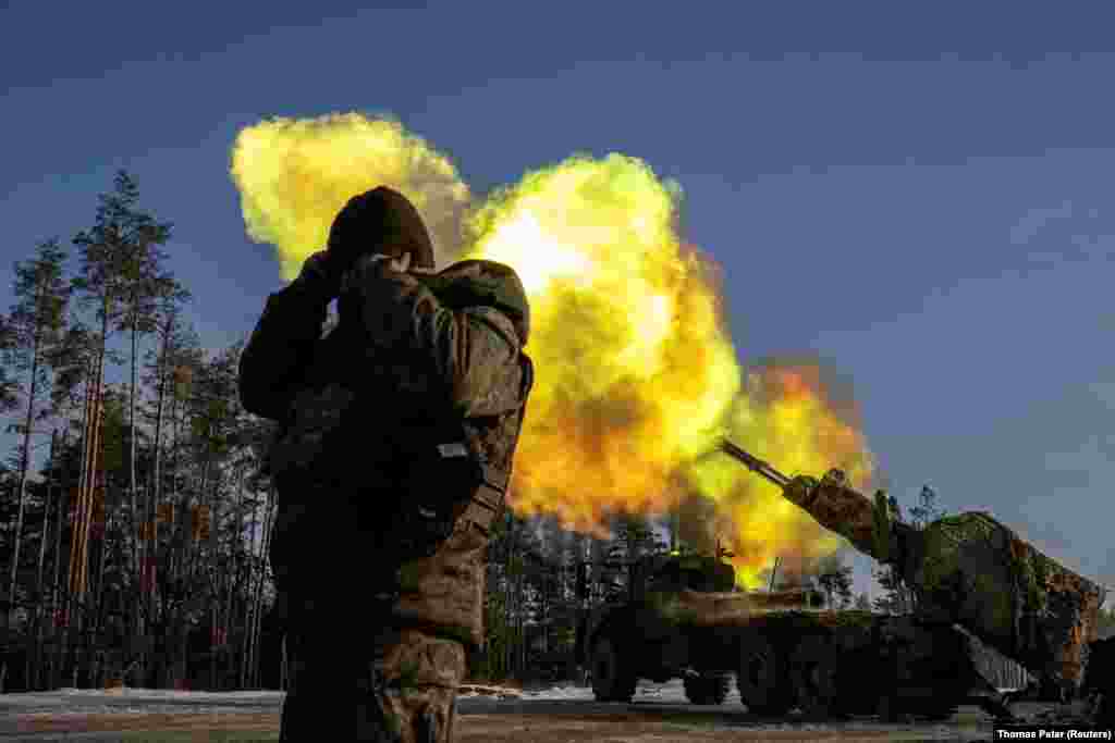 Ukrainian soldiers fire a Swedish-made Archer self-propelled howitzer at Russian positions in the Donetsk region of eastern Ukraine on December 16. Kyiv's forces are facing a shortage of artillery shells and have scaled back some military operations because of a shortfall in foreign assistance, a senior army general told Reuters.