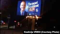 A billboard with presidential candidate Arben Taravari was set on fire in Skopje