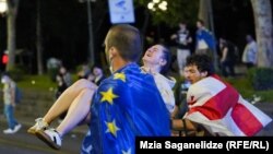 Police In Georgia Use Tear Gas, Water Cannons To Disperse Protesters Outside Of Parliament