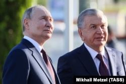 Очільник Росії Володимир Путін і президент Узбекистана Шавкат Мірзоєв