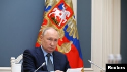 Президент Росії Володимир Путін під час онлайн-саміту G20. 22 листопада 2023 року