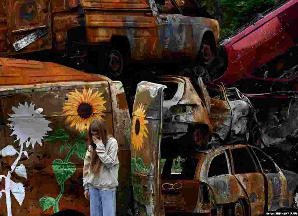 One vehicle owner thanked the artists "for repurposing these cars into something more beautiful." But a Kyiv resident didn't like it, saying, "The memories are still super fresh."