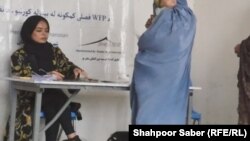 تصویر آرشیف: یکی از زنان کارمند سازمان ملل در غرب افغانستان 