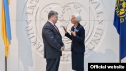 Президент України Петро Порошенко і директор-розпорядник МВФ Крістін Лаґард, архівне фото 