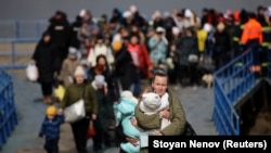 Refugjatët ukrainas duke arritu në Poloni. Mars 2022.