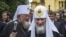 POLAND – Russian Orthodox Patriarch Kirill (C) and Polish Patriarch Sawa, (L) leave the Saint Maria Magdalena Orthodox Church after a ceremony in Warsaw, August 16, 2012 