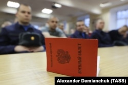 A military ID is pictured at an assembly station of the Leningrad Region military commissariat where conscripts are briefed ahead of departing for military service with the Russian Army in November 2022.