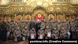 Глава ПЦУ митрополит Київський і всієї України Епіфаній під час зустрічі з українськими воїнами в Михайлівському Золотоверхому соборі, де він провів молебень за Перемогу України над агресором. Київ, 6 січня 2023 року