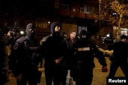 Andrew Tate, i shoqëruar nga policia rumune, 29 dhjetor 2022.