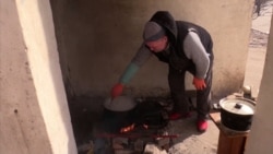 Bombs, Basements, And Burials: Besieged Mariupol Residents Struggle To Survive