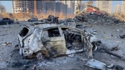 'They're Killing My City': Shock In Kyiv After Strike On Mall