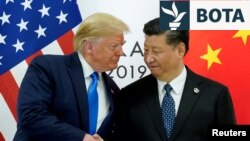 Presidenti i Shteteve të Bashkuara, Donald Trump, dhe lideri i Kinës, Xi Jinping.