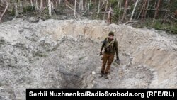 У відвойованому селі Кухарі на Київщині, 30 березня