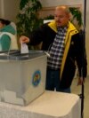 Moldovan Voters Have High Hopes In Nail-Biting Presidential Runoff
