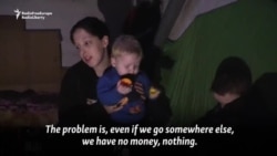 A City On Ukraine's Front Line: Sleeping In Basements, Cooking By Fire